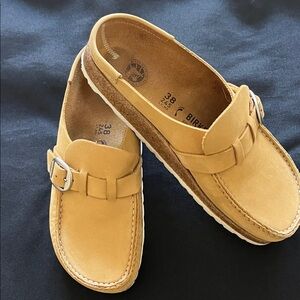 BIRKENSTOCK “Buckley” Mule in Tan Nubuck.